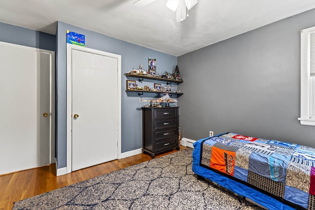 337 Lepes Road Somerset, MA 02726 - Photo 15 of 29 a bedroom with bed and wooden floor