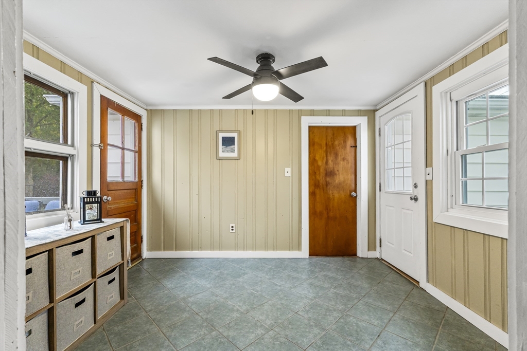 337 Lepes Road Somerset, MA 02726 - Photo 24 of 29 a view of a livingroom with a window and a ceiling fan