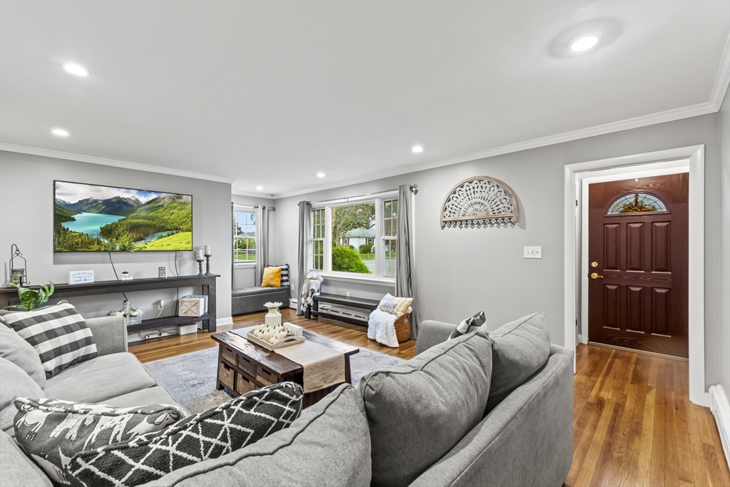 337 Lepes Road Somerset, MA 02726 - Photo 4 of 29 a living room with furniture and a flat screen tv