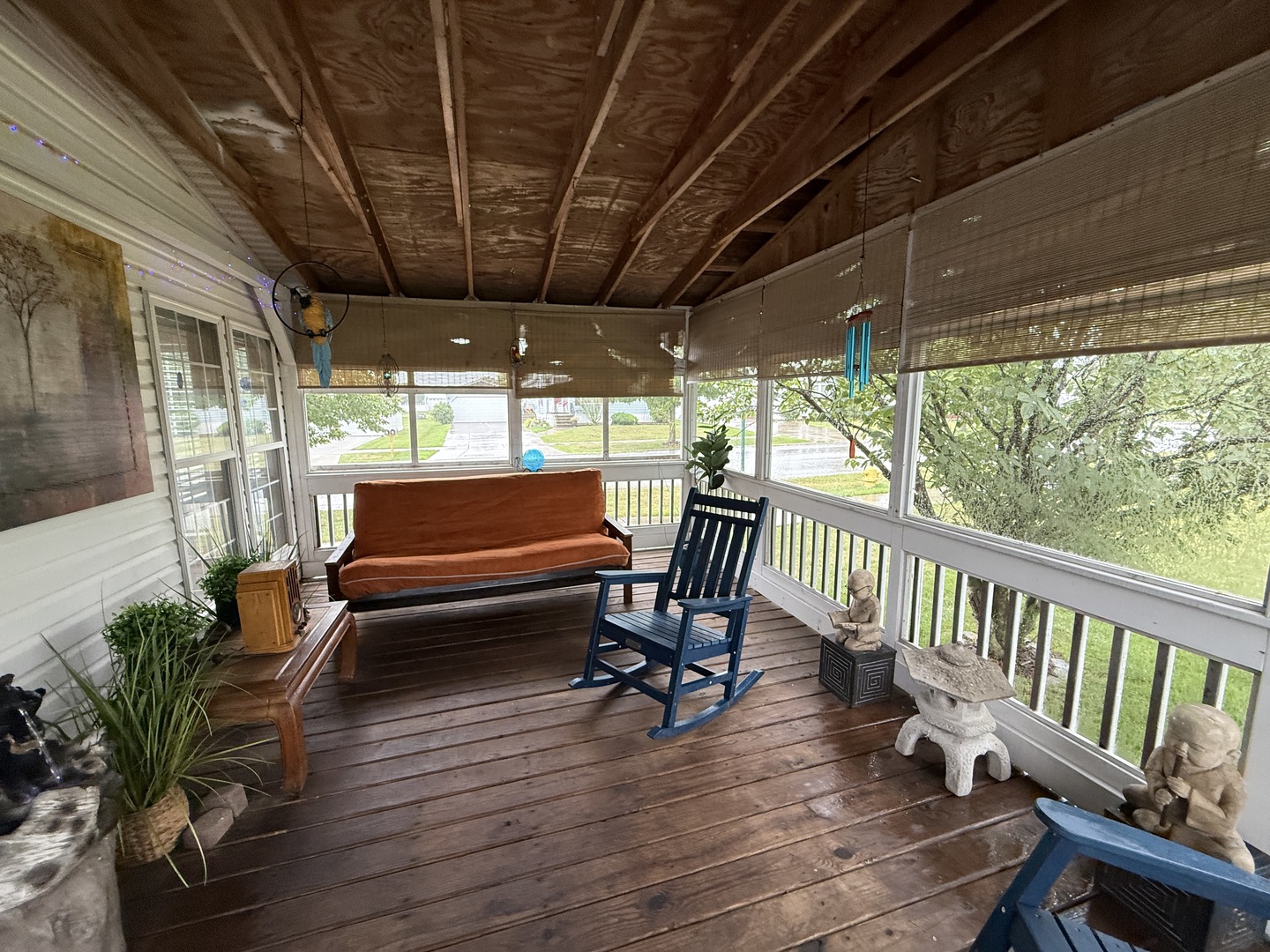 69 Petunia Circle Matteson, IL 60443 - Photo 13 of 25 a view of a porch with furniture and a yard