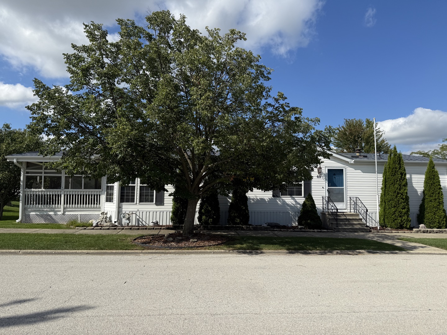 69 Petunia Circle Matteson, IL 60443 - Photo 24 of 25 a front view of a house with a yard
