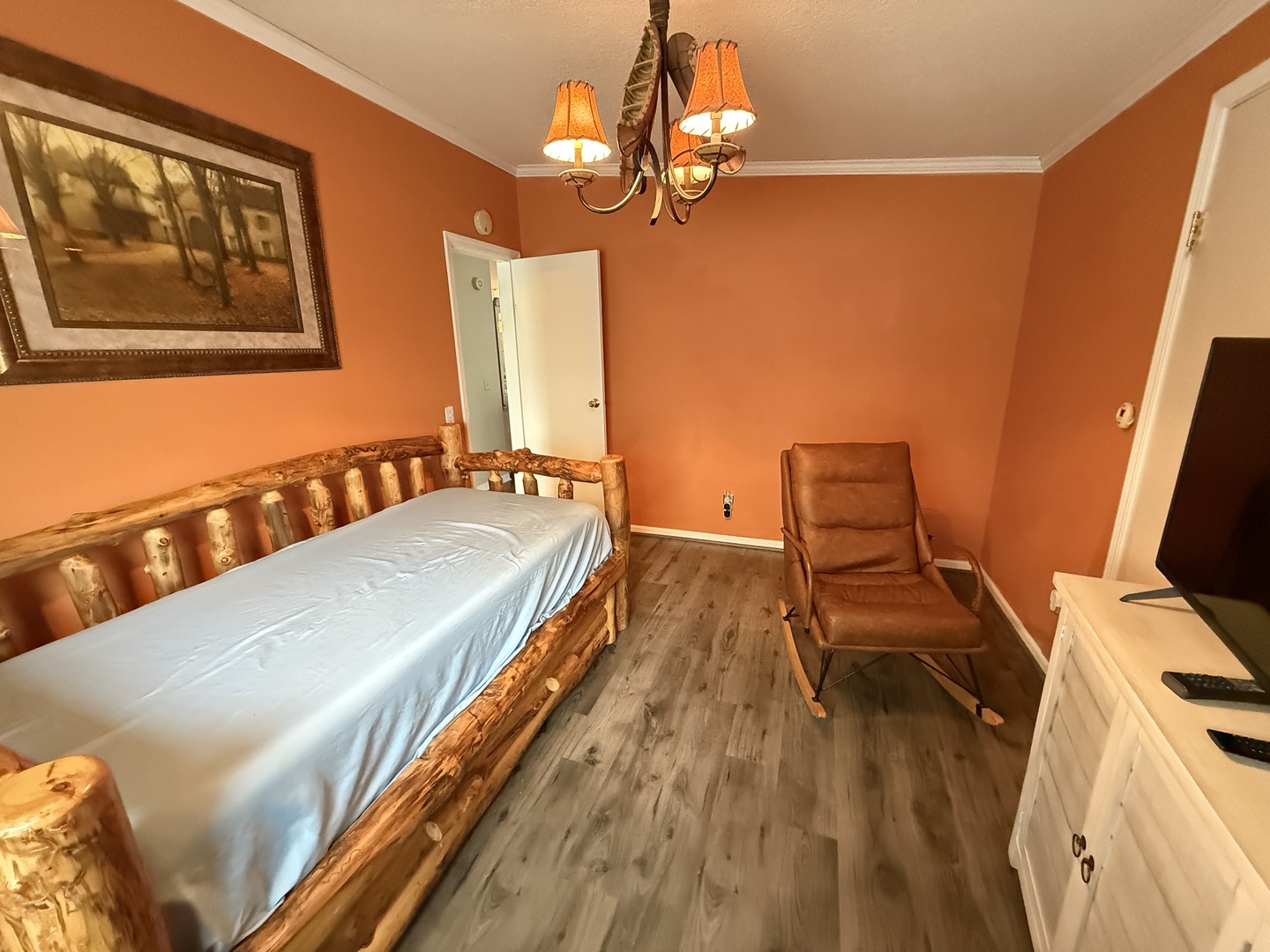 69 Petunia Circle Matteson, IL 60443 - Photo 8 of 25 a bedroom with a bed and wooden floor