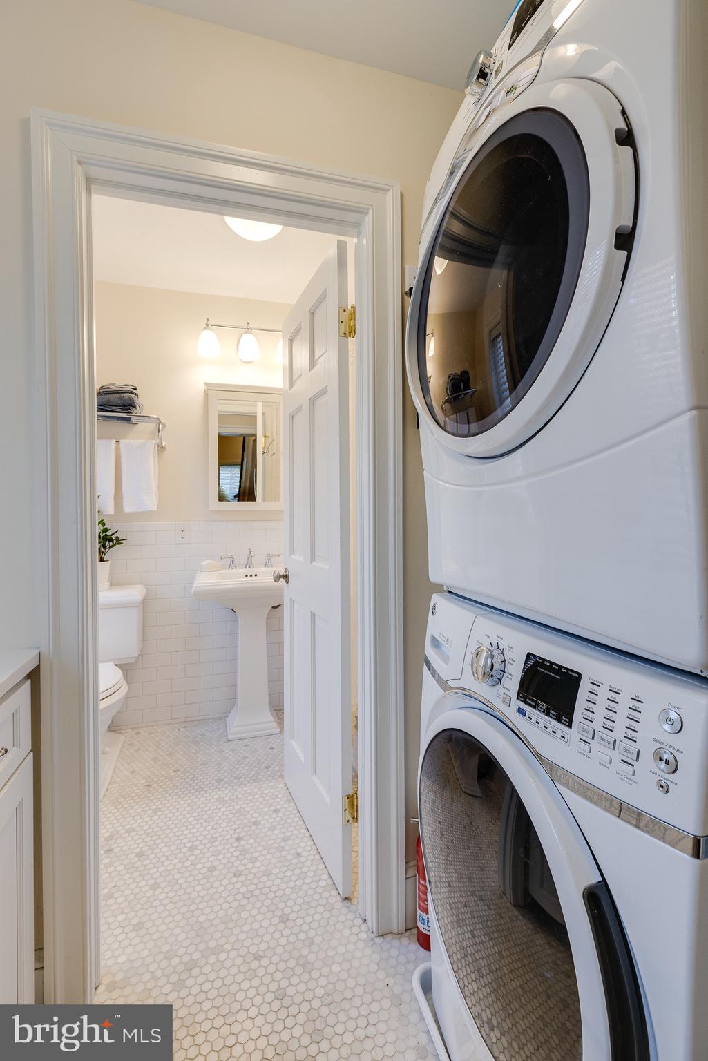 2051 Appletree Street Philadelphia, PA 19103 - Photo 16 of 36 Second-floor laundry with folding area