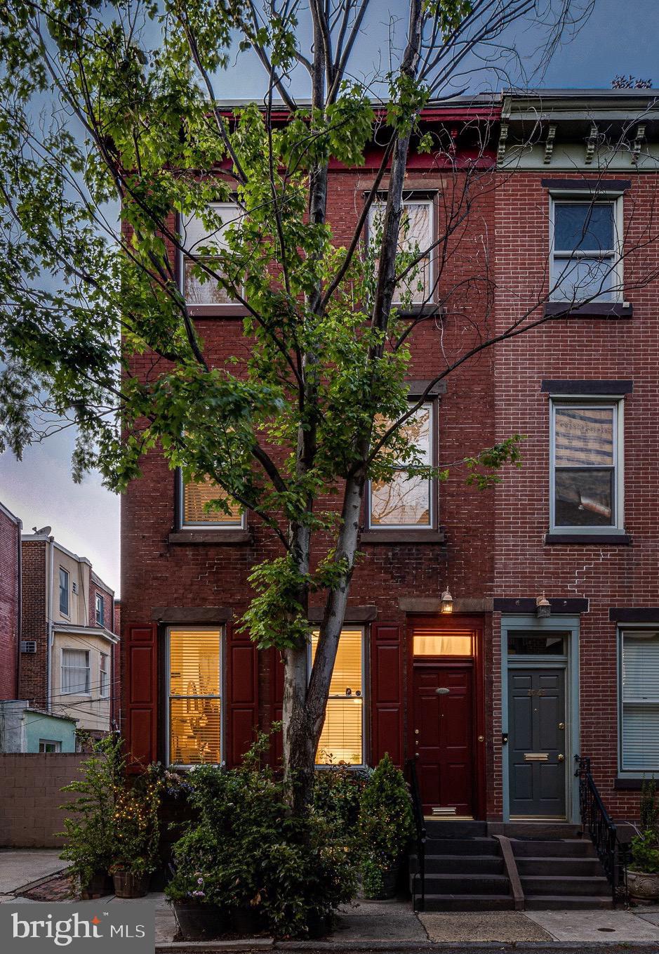 2051 Appletree Street Philadelphia, PA 19103 - Photo 2 of 36 Solid brick exterior with lush planters
