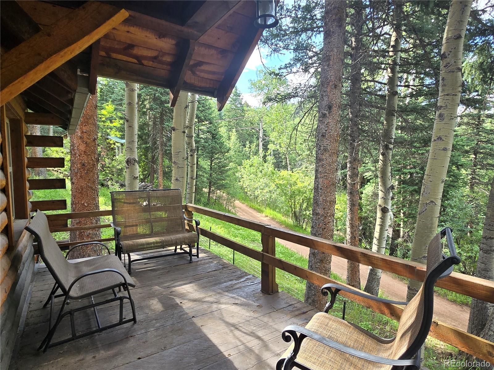 9626 Highway 165 Rye, CO 81069 - Photo 6 of 27 a view of a two chairs in the deck