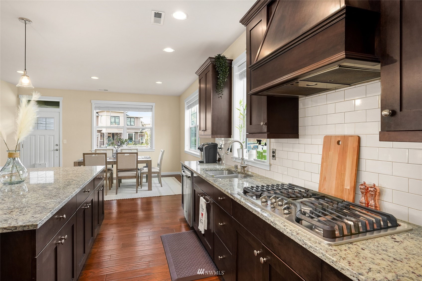 532 Ludwig Road Snohomish, WA 98290 - Photo 17 of 40 a kitchen with stainless steel appliances granite countertop a sink stove and cabinets