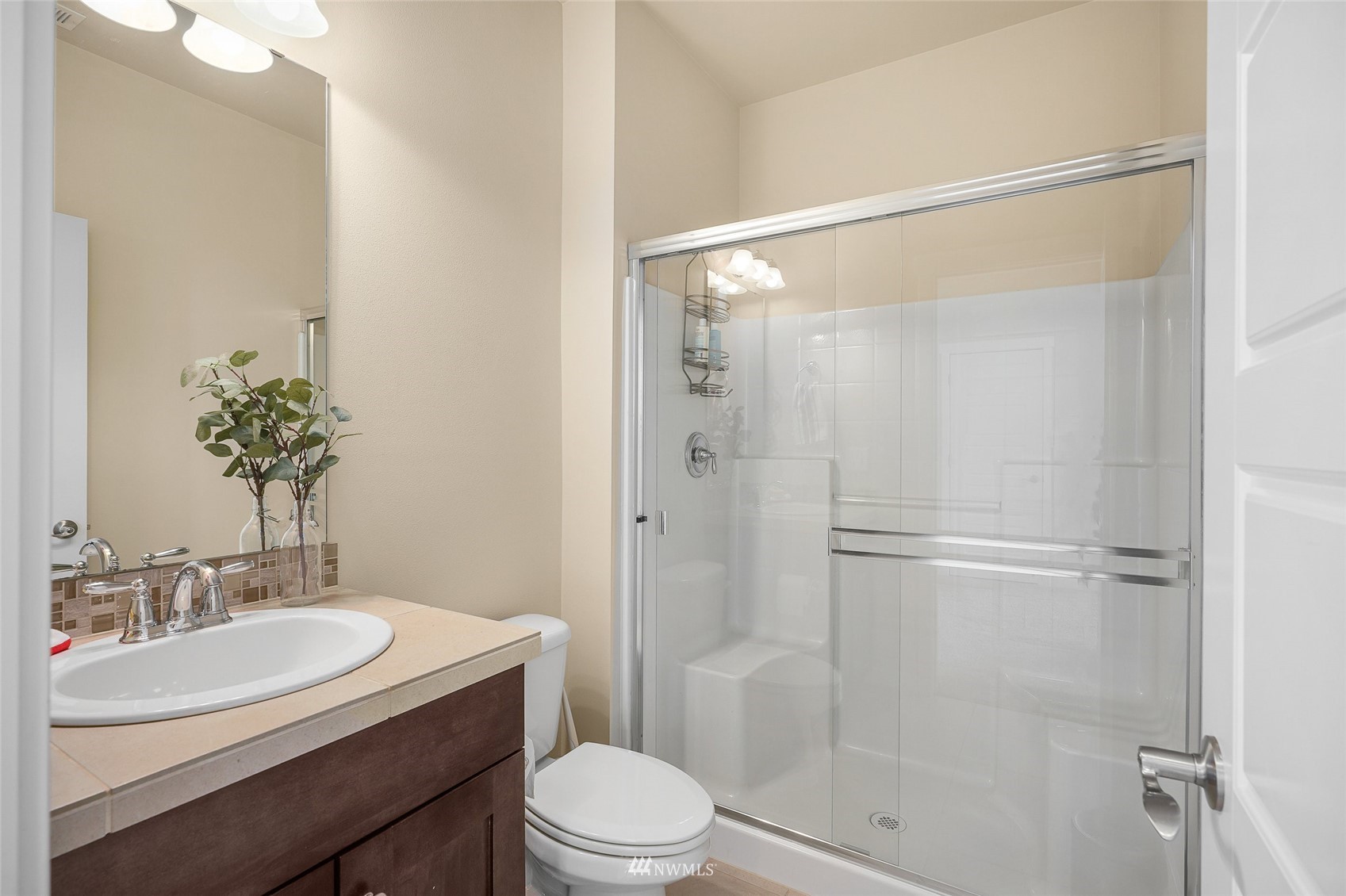 532 Ludwig Road Snohomish, WA 98290 - Photo 22 of 40 a bathroom with a granite countertop sink toilet and shower