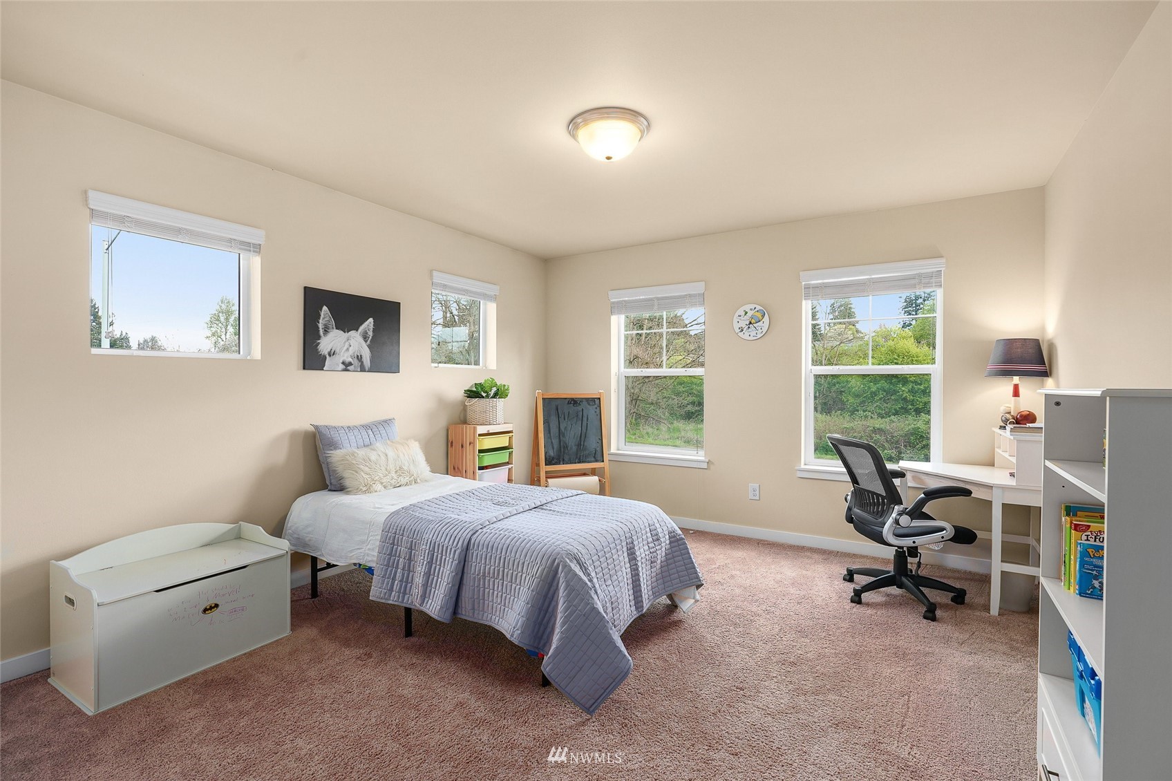532 Ludwig Road Snohomish, WA 98290 - Photo 34 of 40 a bedroom with a bed a table and chair
