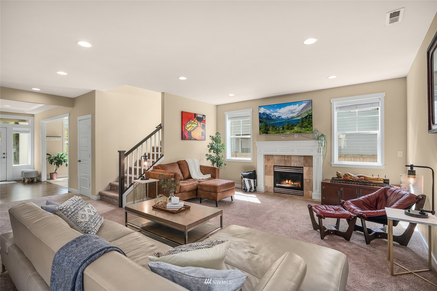 532 Ludwig Road Snohomish, WA 98290 - Photo 8 of 40 a living room with furniture fireplace and a large window