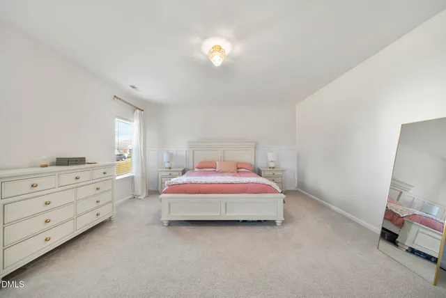 a view of kitchen and hall with wooden floor