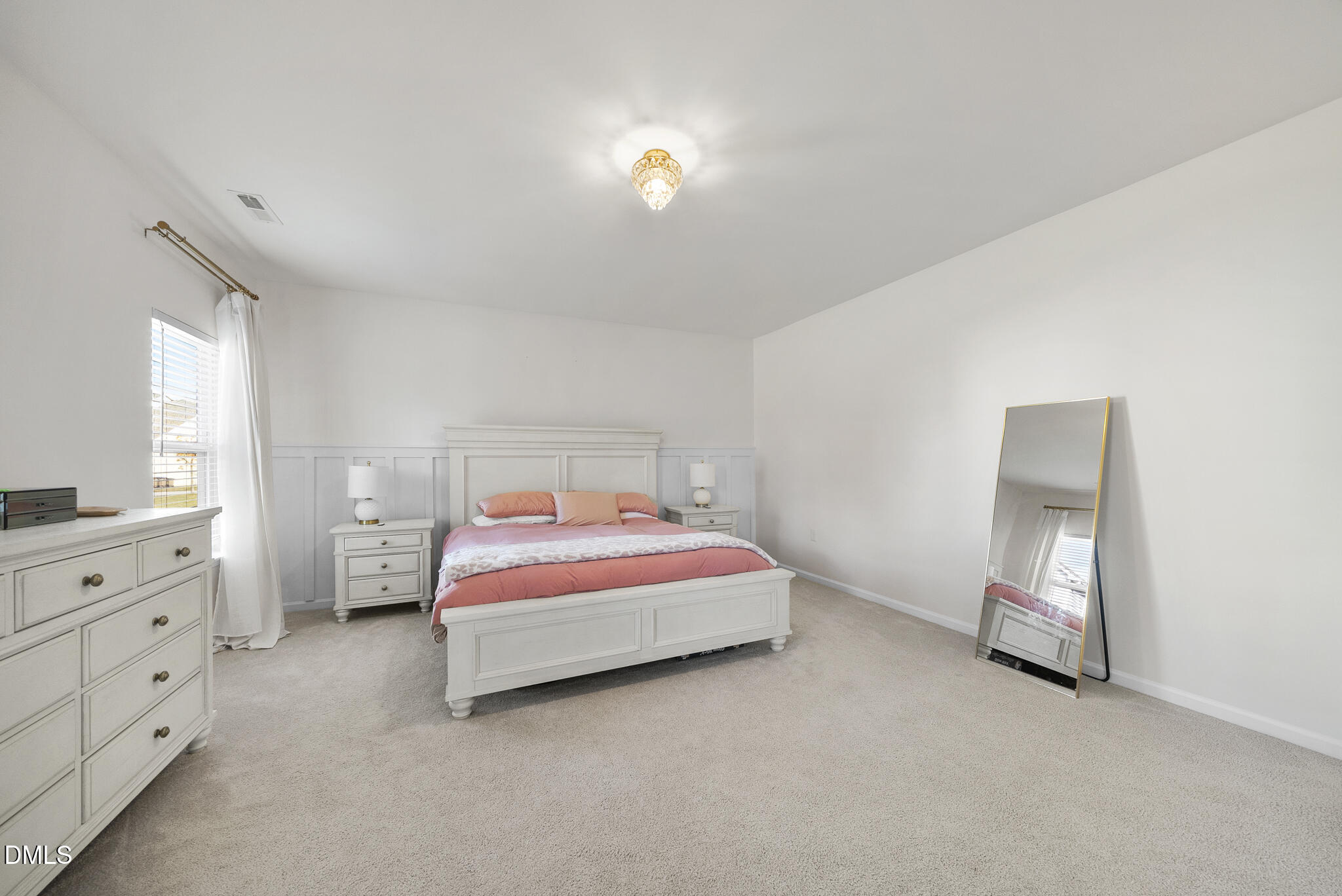 672 Millers Mark Avenue Wake Forest, NC 27587 - Photo 19 of 41 a bedroom with bed and window
