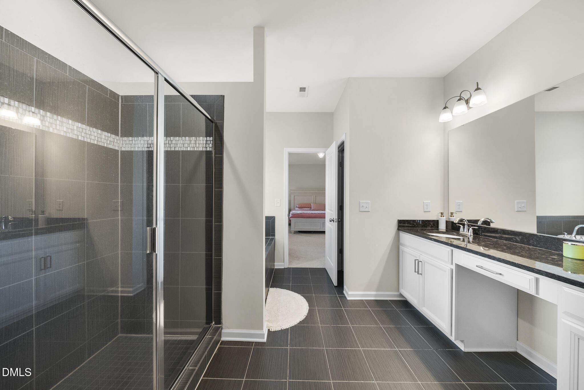 672 Millers Mark Avenue Wake Forest, NC 27587 - Photo 22 of 41 a bathroom with a granite countertop sink a toilet and shower