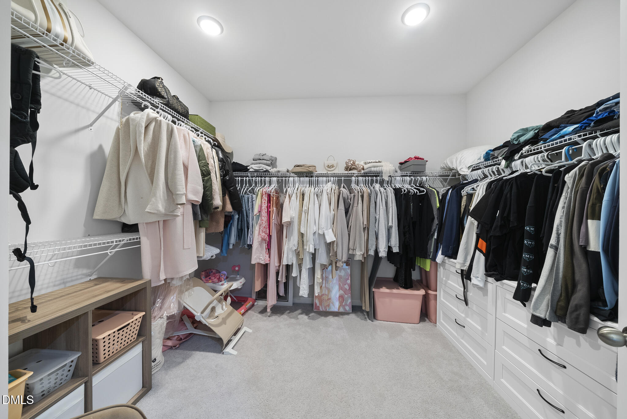 672 Millers Mark Avenue Wake Forest, NC 27587 - Photo 23 of 41 a view of walk in closet with clothes and shoes