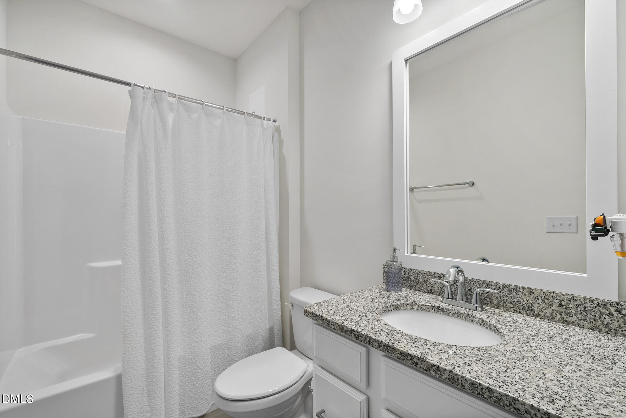 672 Millers Mark Avenue Wake Forest, NC 27587 - Photo 26 of 41 a bathroom with a granite countertop sink toilet and shower