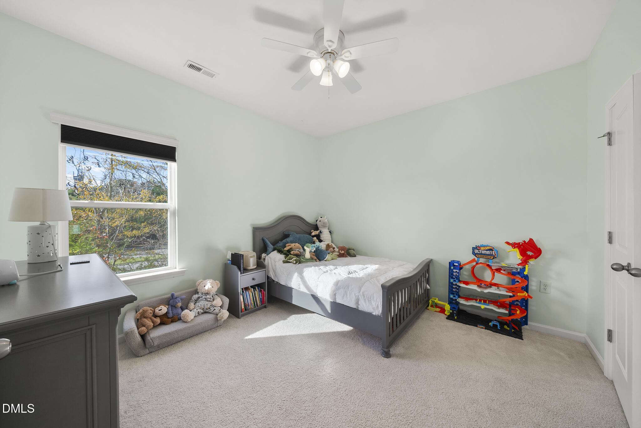 672 Millers Mark Avenue Wake Forest, NC 27587 - Photo 27 of 41 a bedroom with a bed and a window