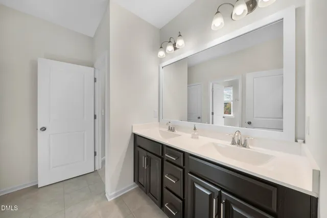 a bed room with furniture and a window