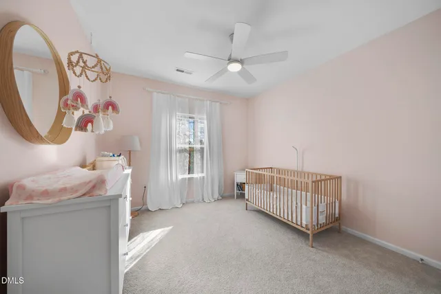 a bathroom with a sink double vanity and a mirror