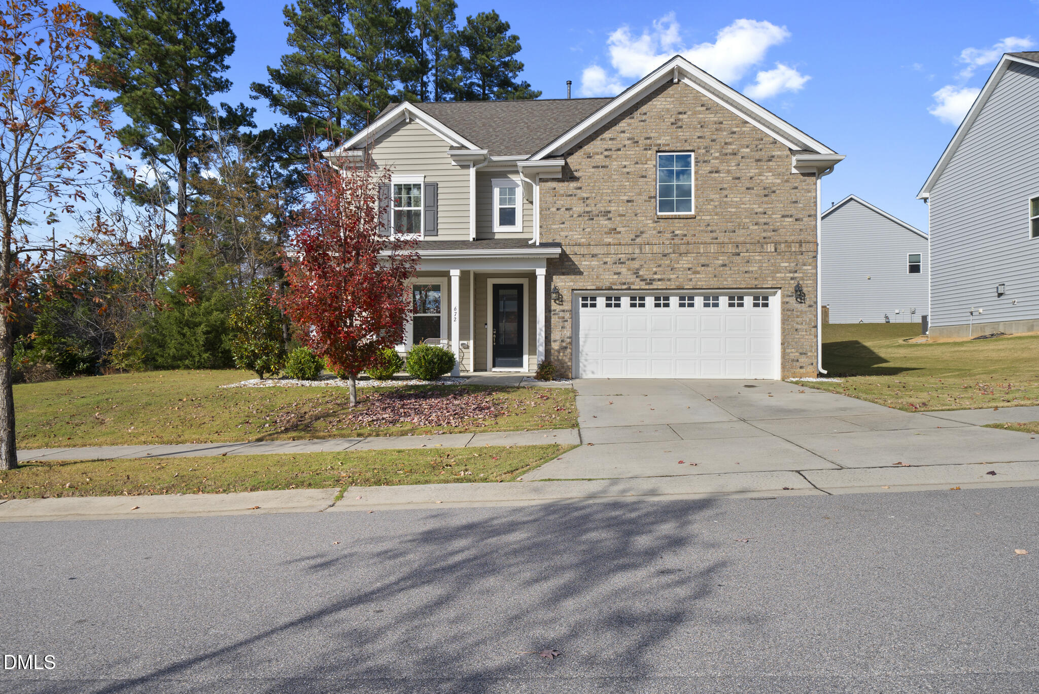 672 Millers Mark Avenue Wake Forest, NC 27587 - Photo 2 of 41 a front view of a house with a yard