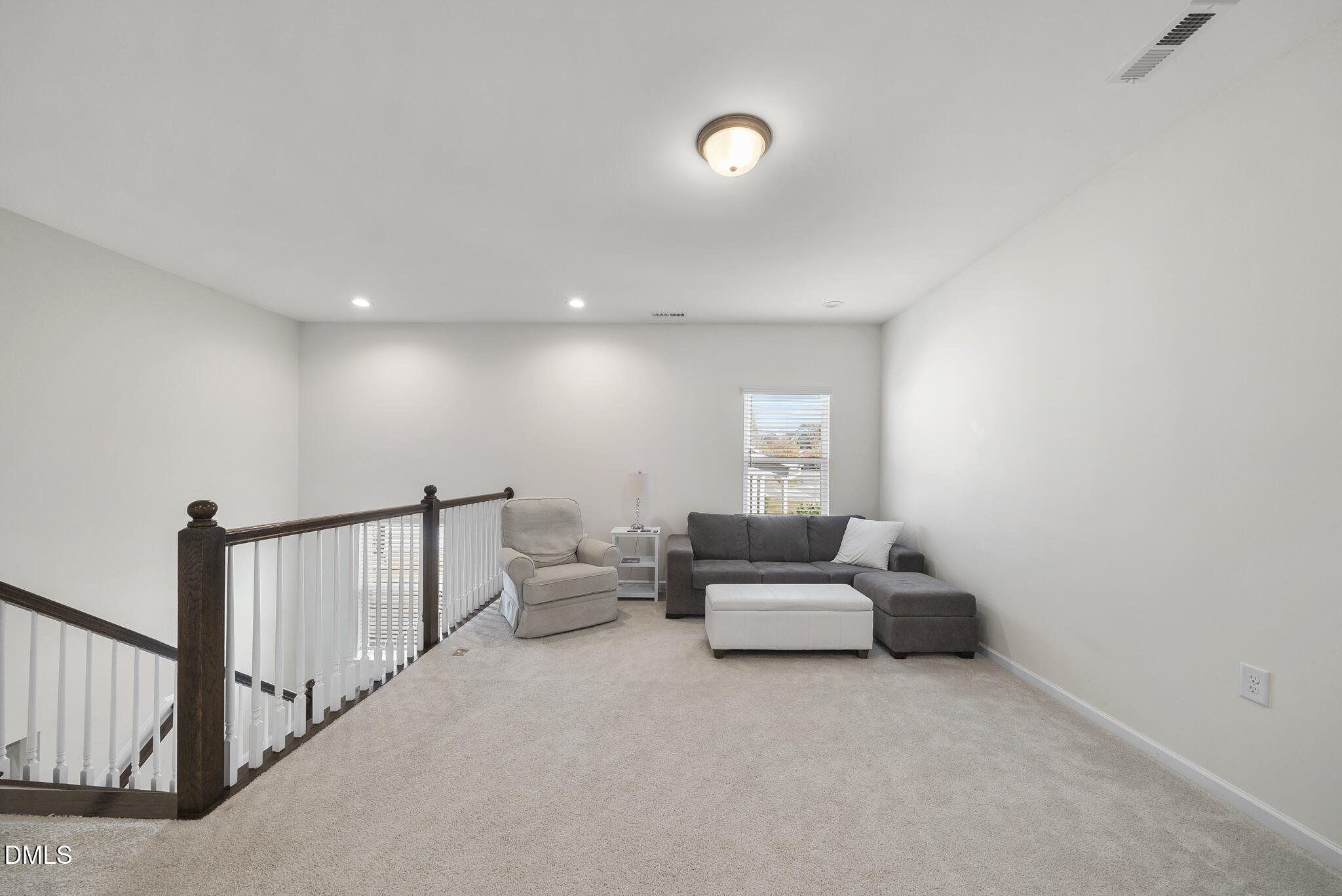 672 Millers Mark Avenue Wake Forest, NC 27587 - Photo 33 of 41 a living room with furniture and a couch