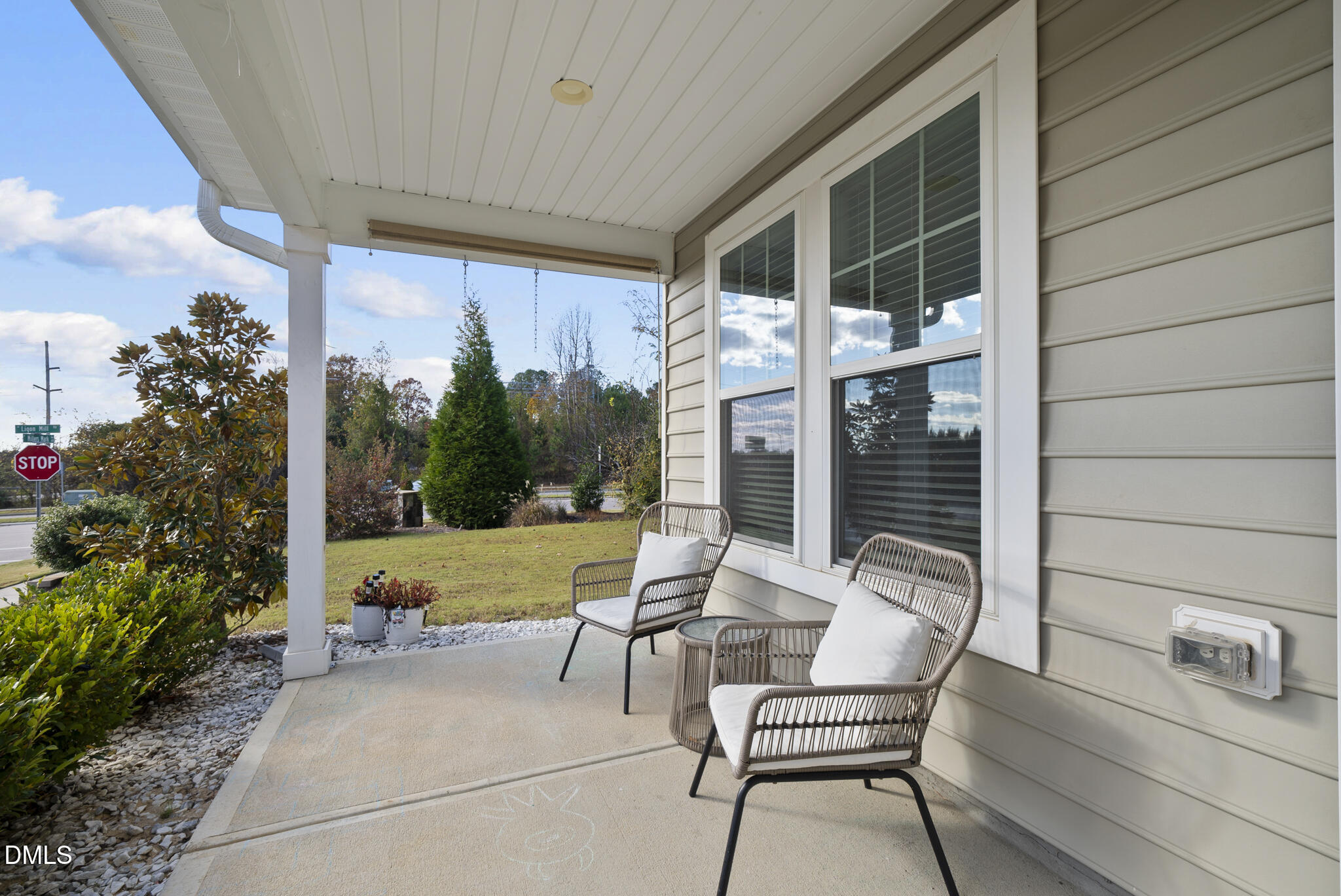 672 Millers Mark Avenue Wake Forest, NC 27587 - Photo 3 of 41 a view of a chair and tables in patio