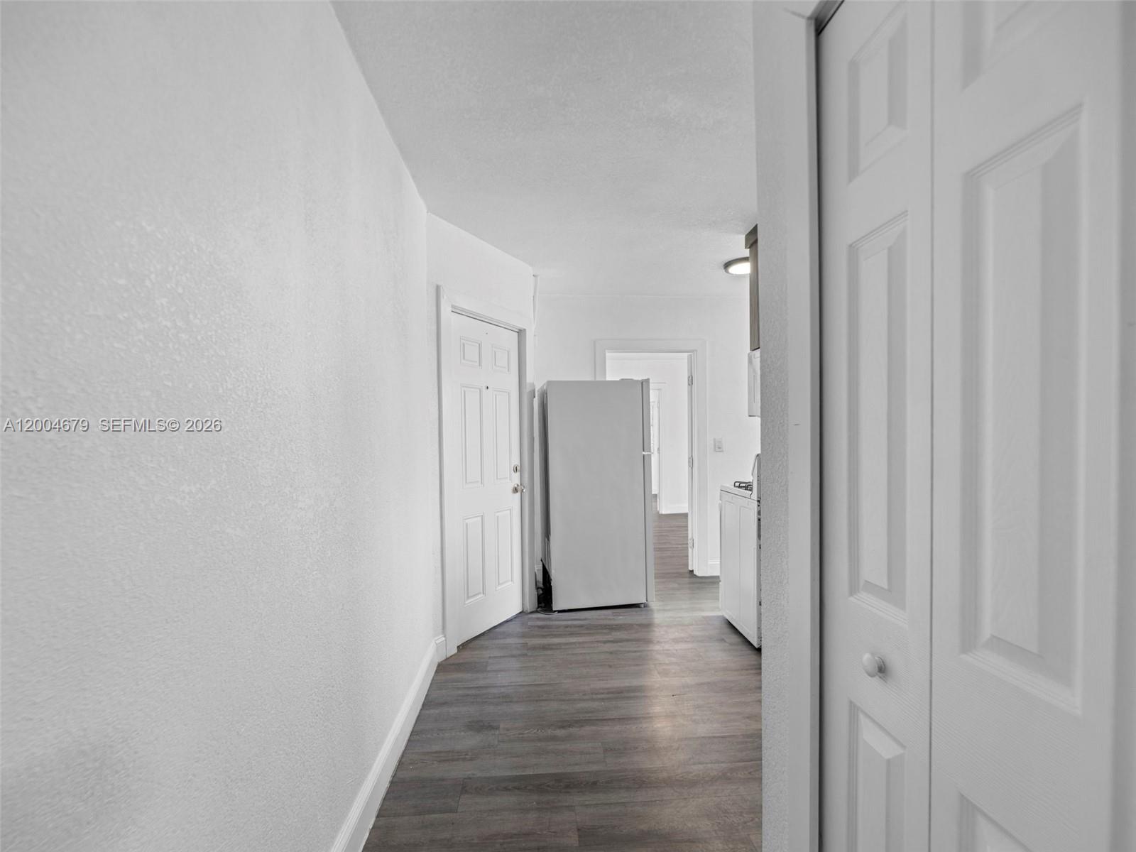 500 Southwest 8th Street Miami, FL 33130 - Photo 15 of 33 a view of a hallway with wooden floor
