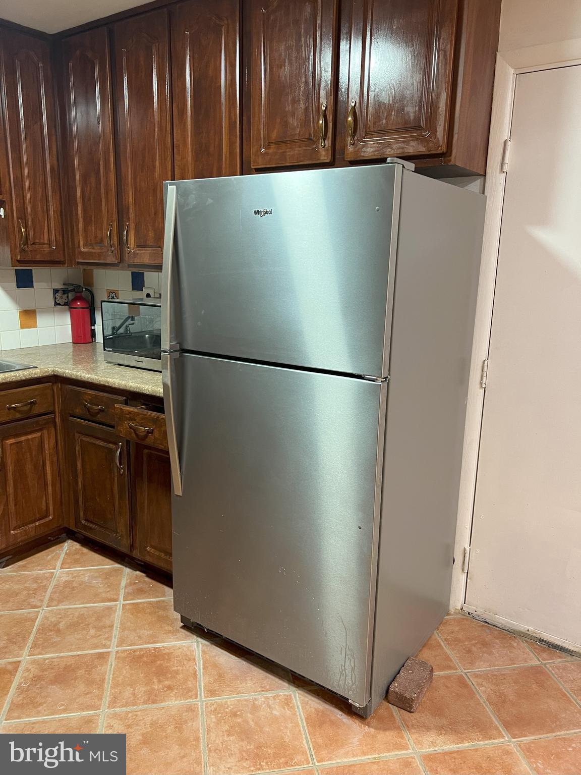109 Pebble Road East Windsor, NJ 08520 - Photo 11 of 61 a white refrigerator freezer sitting inside of a kitchen