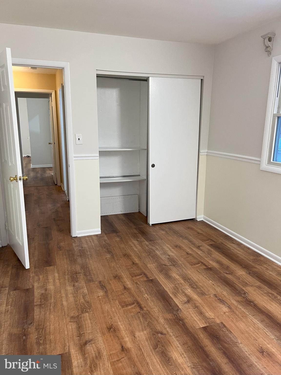 109 Pebble Road East Windsor, NJ 08520 - Photo 45 of 61 a view of empty room with wooden floor