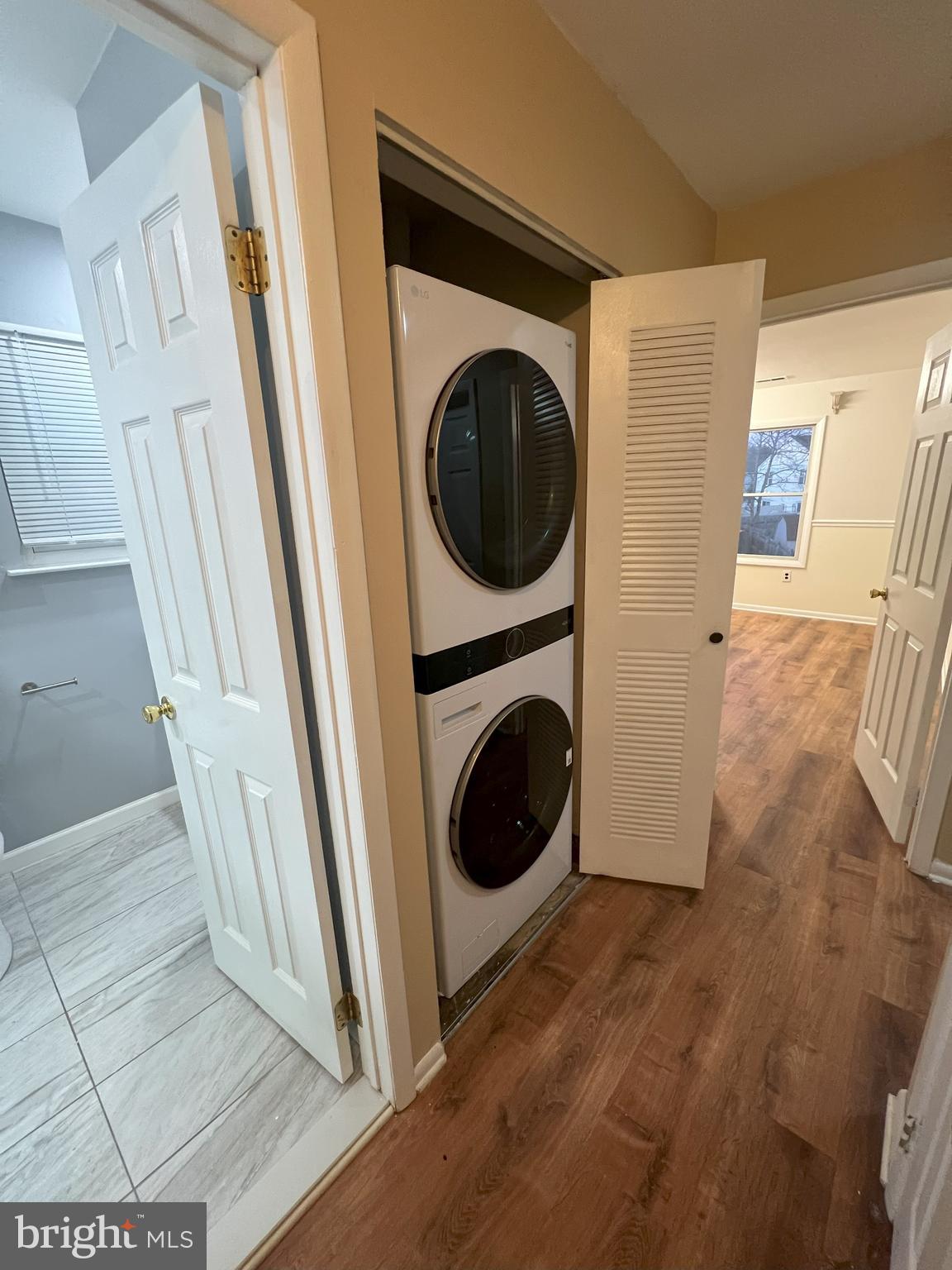 109 Pebble Road East Windsor, NJ 08520 - Photo 57 of 61 a view of a storage and utility room with washer and dryer