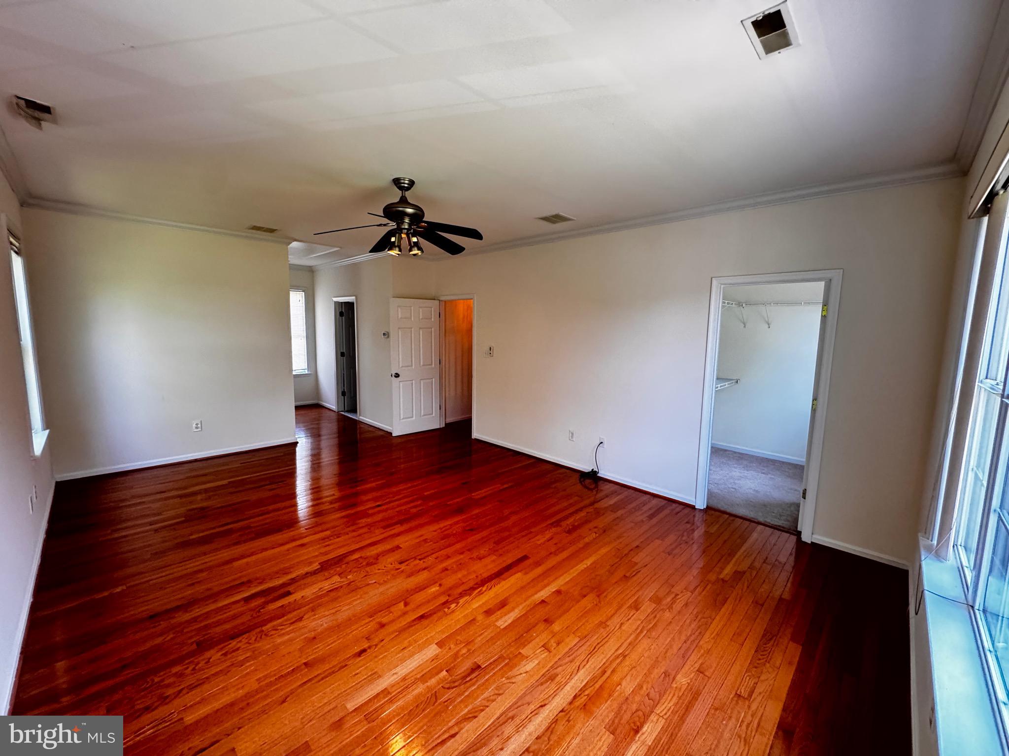 2653 Sandymount Road Finksburg, MD 21048 - Photo 11 of 68 wooden floor in an empty room with a window