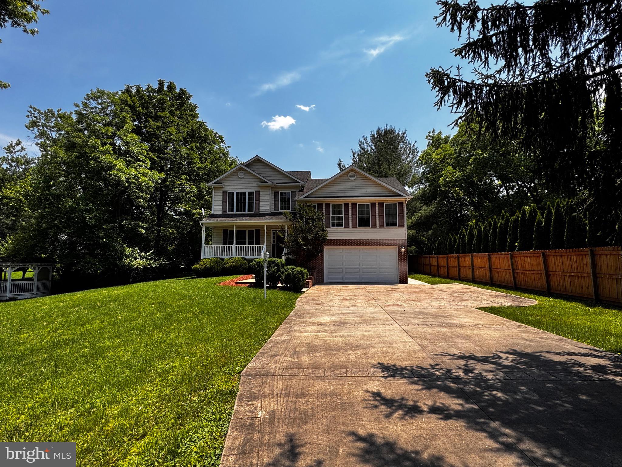 2653 Sandymount Road Finksburg, MD 21048 - Photo 3 of 68 a front view of a house with yard patio and green space