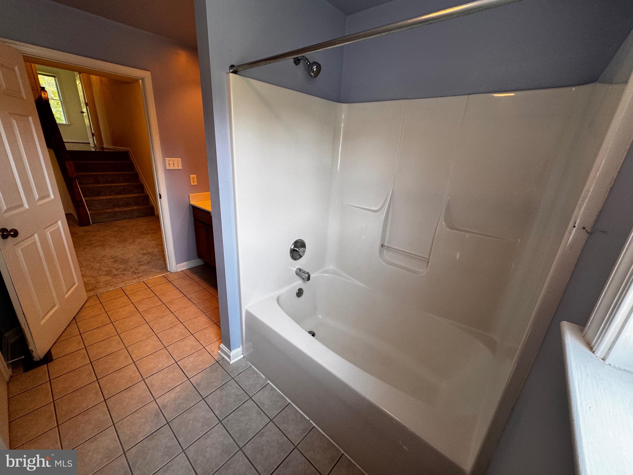 2653 Sandymount Road Finksburg, MD 21048 - Photo 31 of 68 a bathroom with a bathtub and a shower