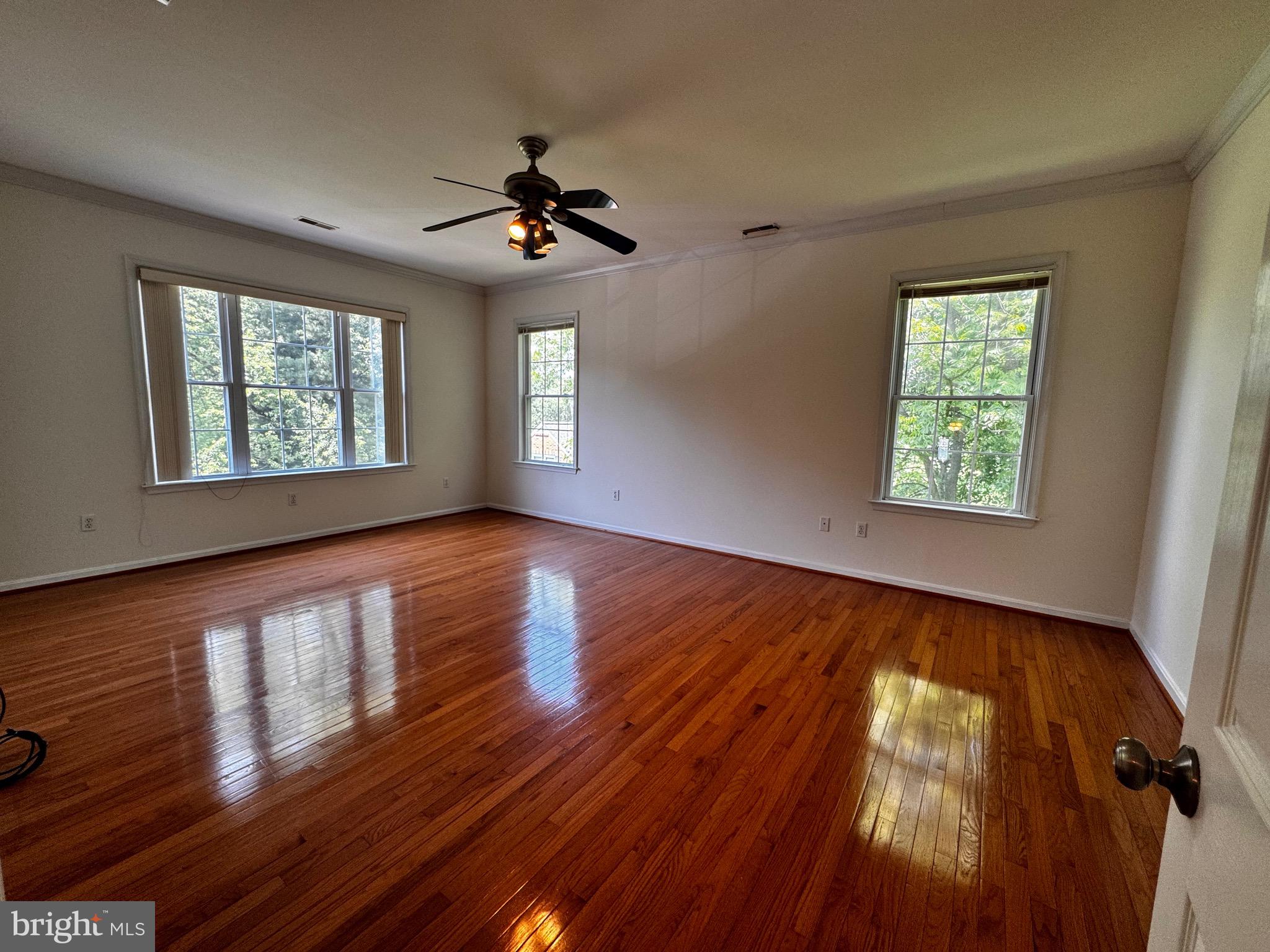 2653 Sandymount Road Finksburg, MD 21048 - Photo 38 of 68 a view of an empty room with wooden floor and a window