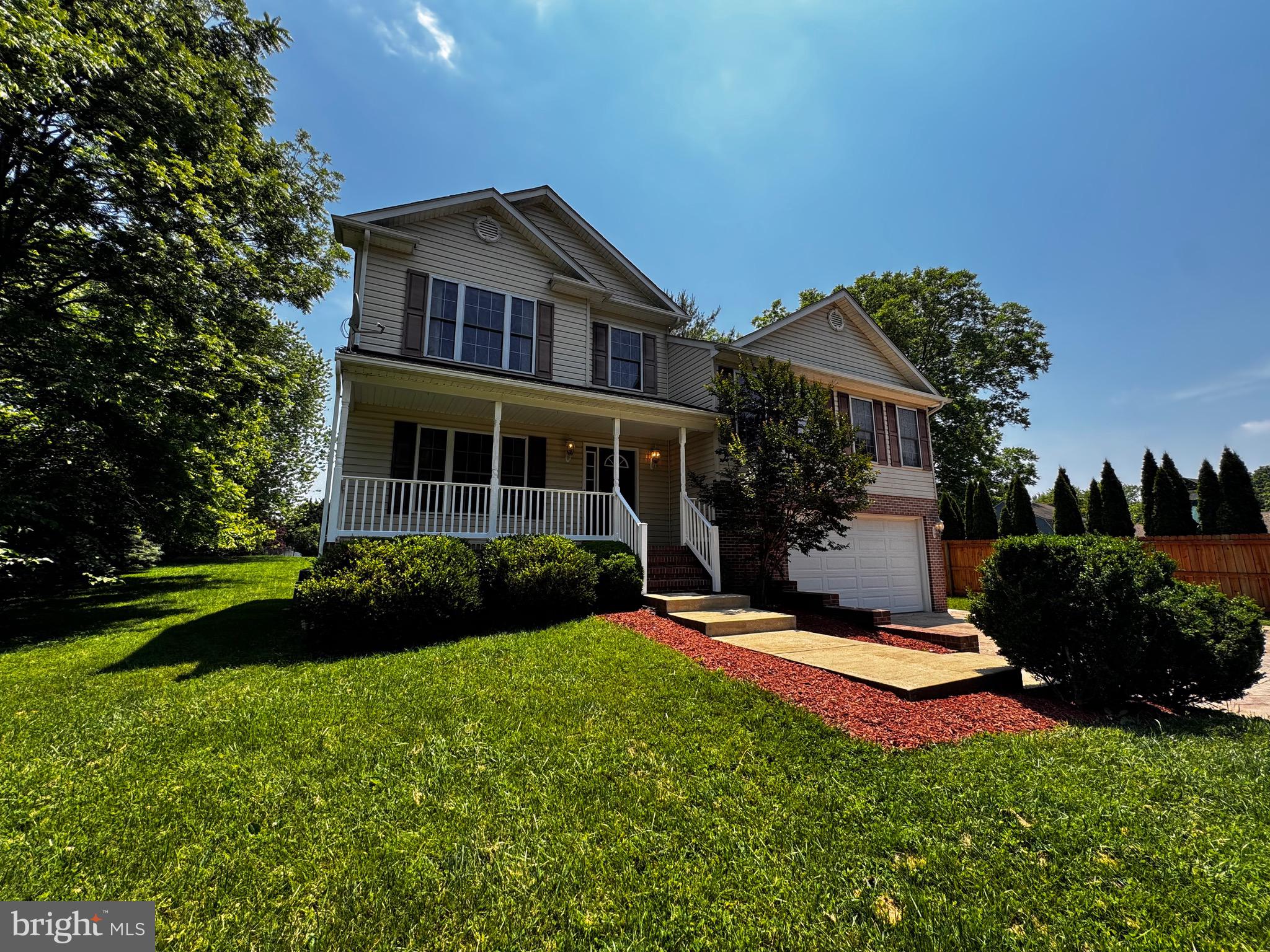 2653 Sandymount Road Finksburg, MD 21048 - Photo 5 of 68 a front view of a house with a yard