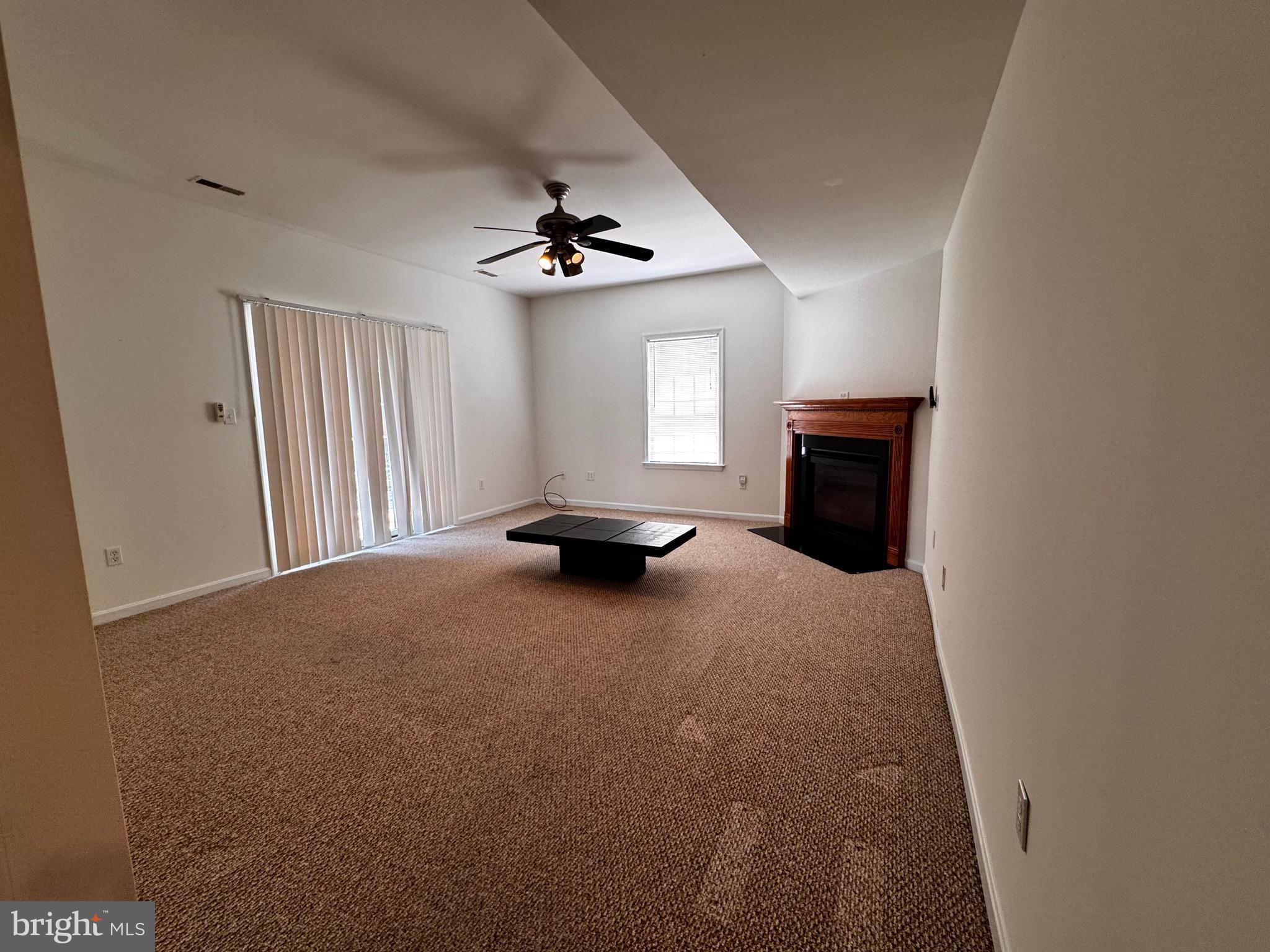 2653 Sandymount Road Finksburg, MD 21048 - Photo 54 of 68 a view of a livingroom with a fireplace and window