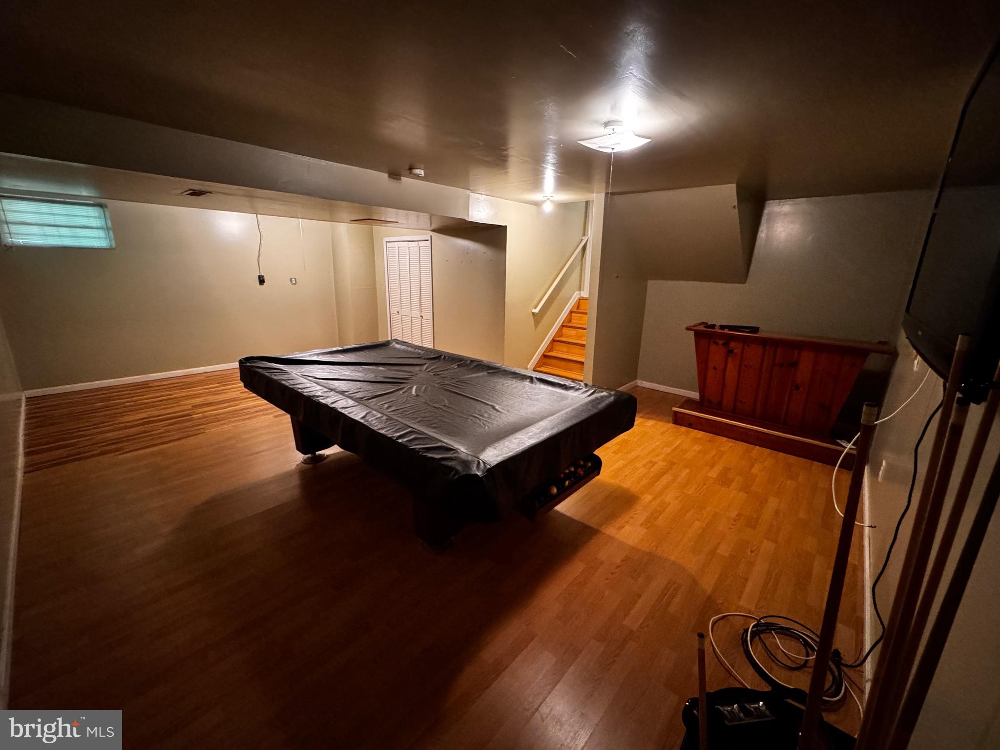 2653 Sandymount Road Finksburg, MD 21048 - Photo 61 of 68 a view of an empty room with wooden floor