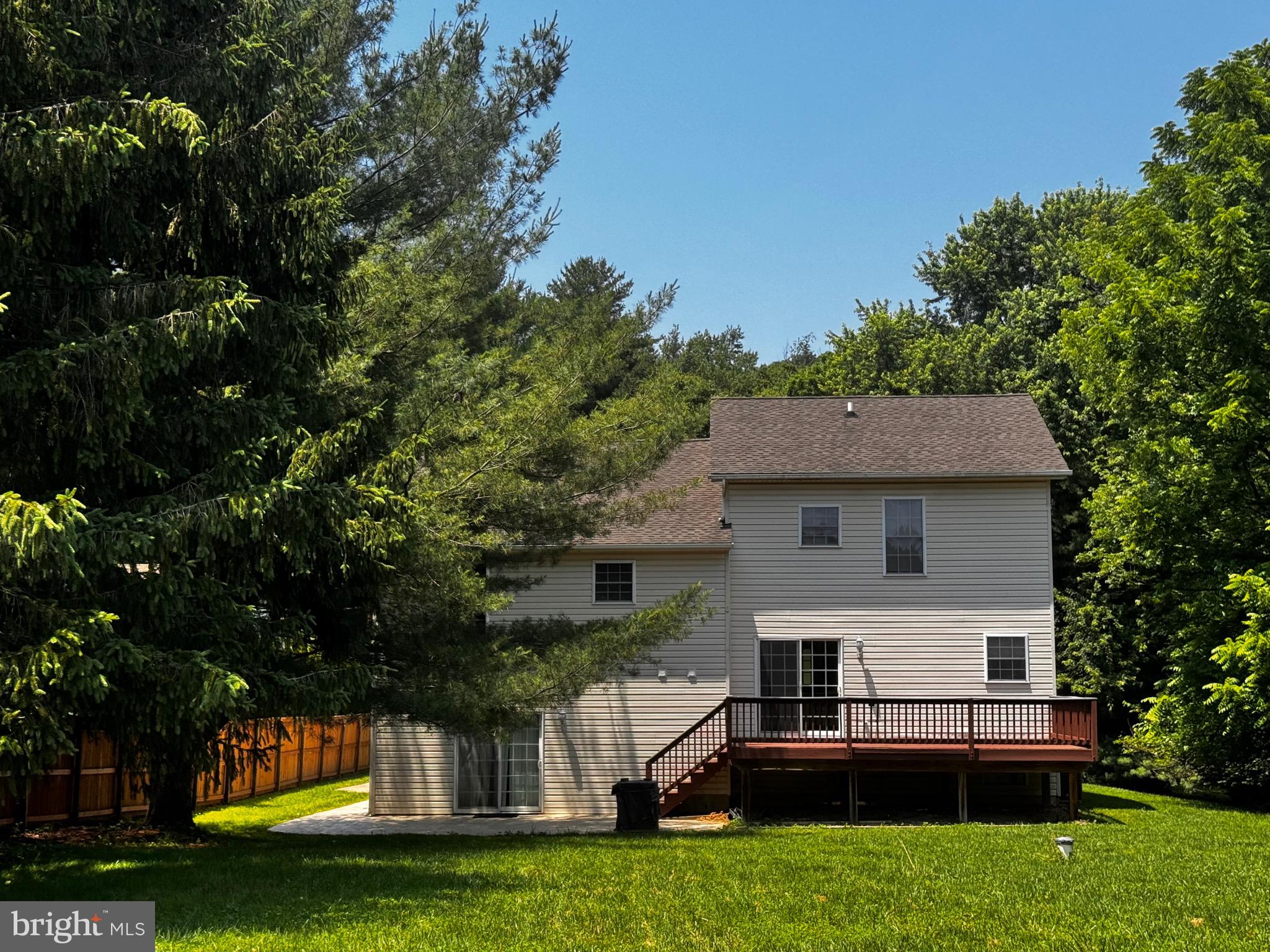 2653 Sandymount Road Finksburg, MD 21048 - Photo 65 of 68 a front view of a house with a garden and trees