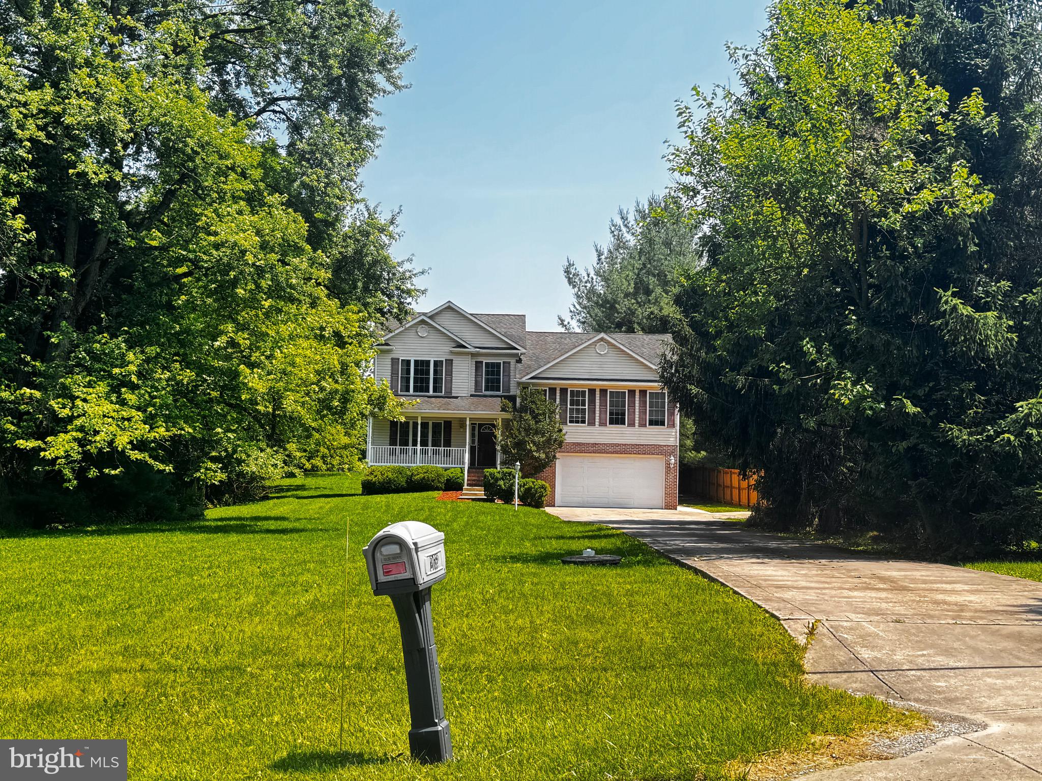 2653 Sandymount Road Finksburg, MD 21048 - Photo 7 of 68 a front view of a house with garden