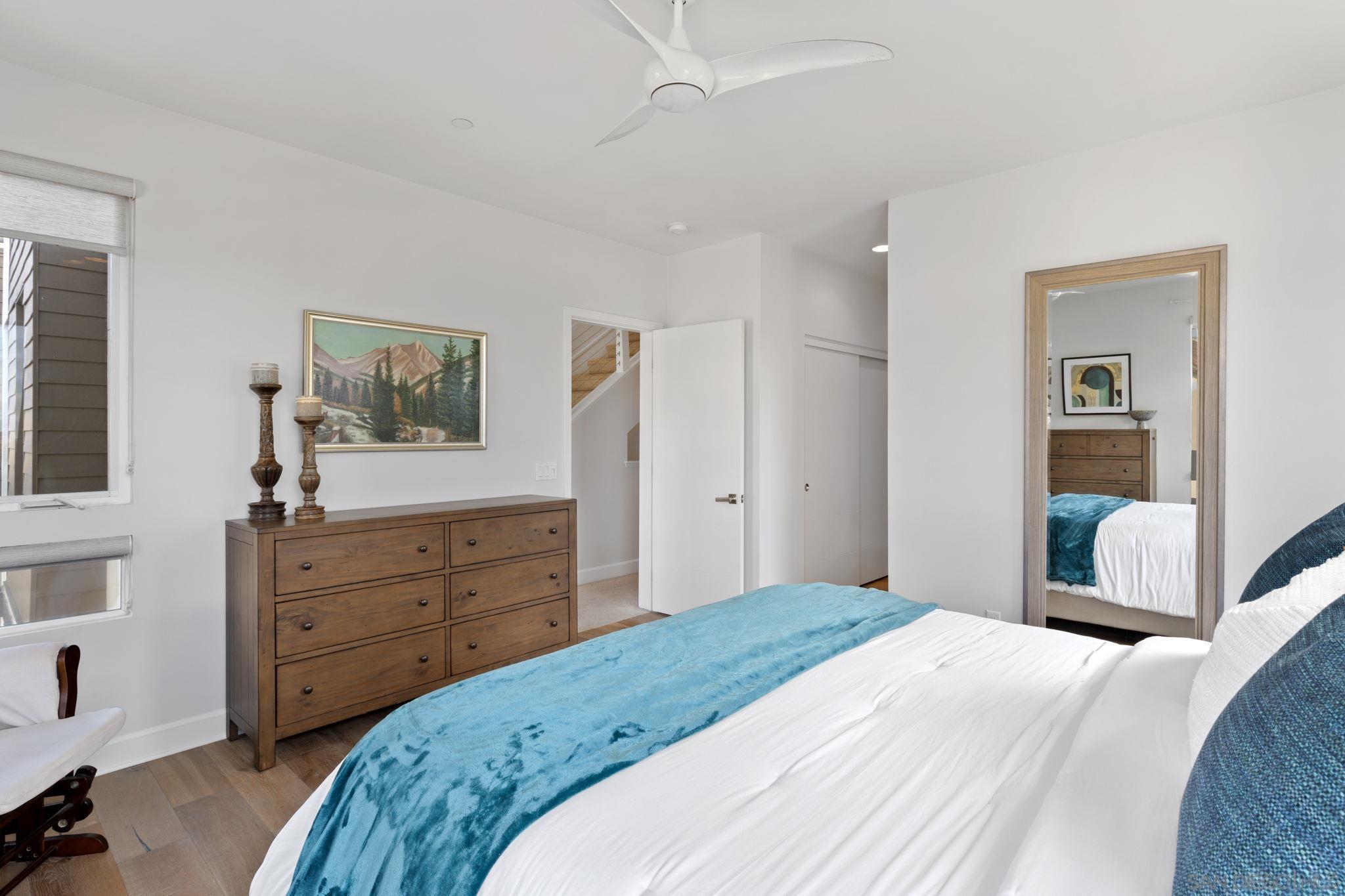 2521 Ate Street Carlsbad, CA 92008 - Photo 21 of 30 a bedroom with a bed and a dresser