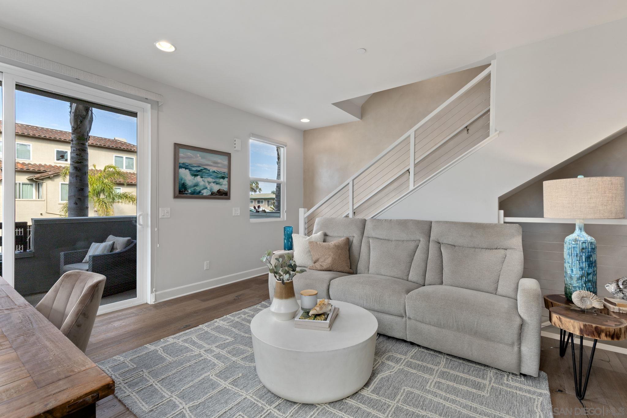 2521 Ate Street Carlsbad, CA 92008 - Photo 9 of 30 a living room with furniture and a potted plant
