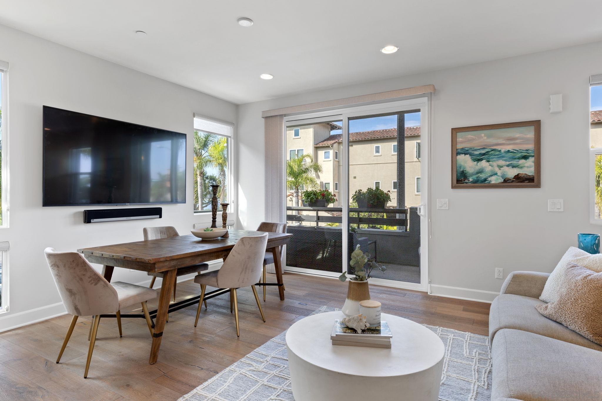 2521 Ate Street Carlsbad, CA 92008 - Photo 10 of 30 a living room with patio furniture and a flat screen tv