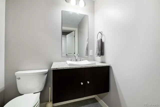 a bathroom with a tub a sink and a shower