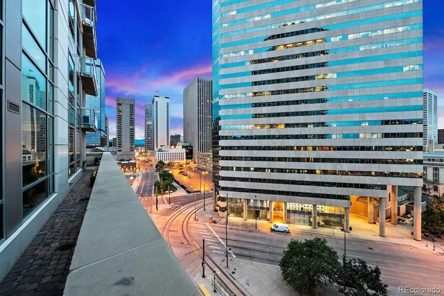 a view of a balcony with chairs