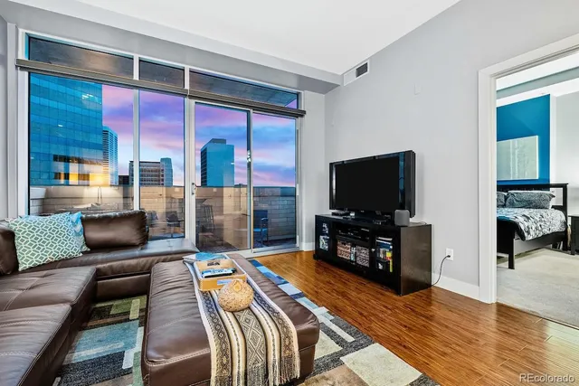 a kitchen with a sink and a stove top oven