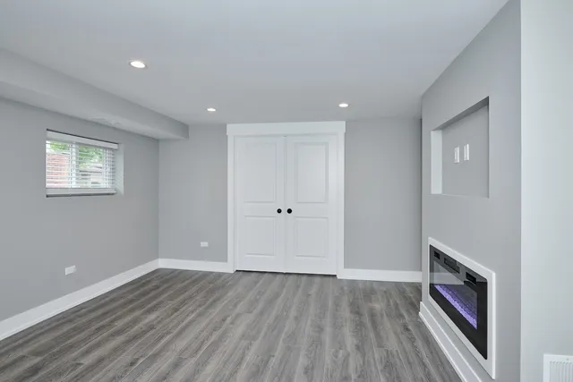 a view of entryway with wooden floor