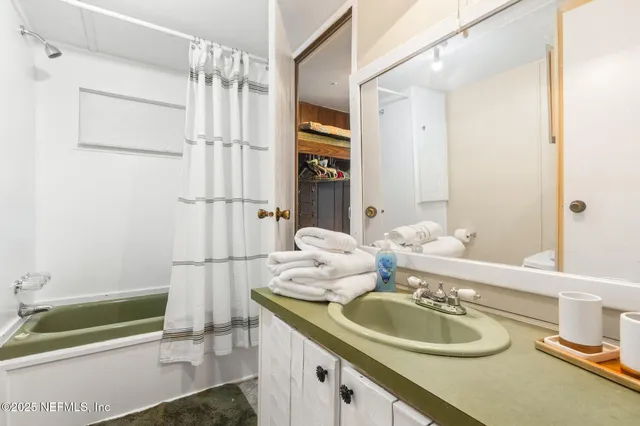 a view of a backyard with sitting area