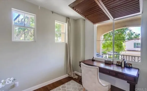 a bathroom with a double vanity sink mirror and toilet