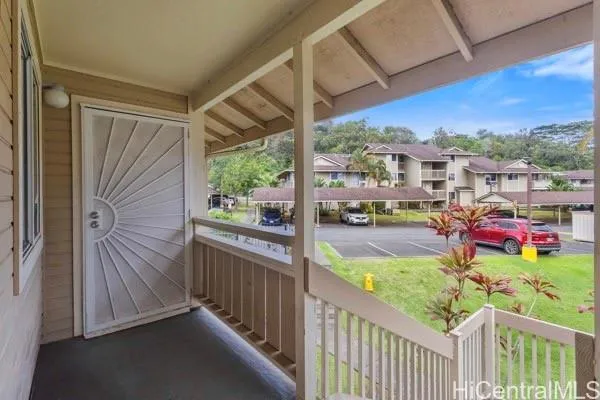 a view of a porch with furniture