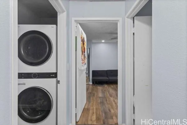 a view of a hallway with washer and dryer