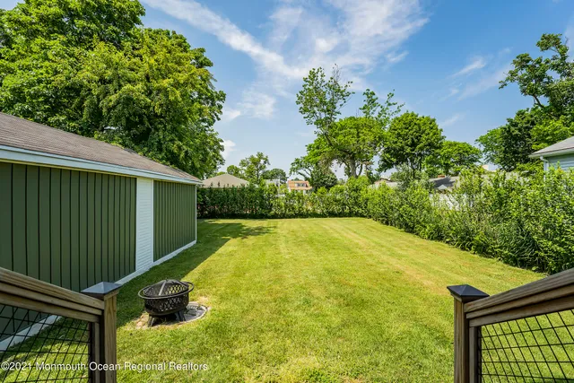 a view of entryway with wooden floor and stairs