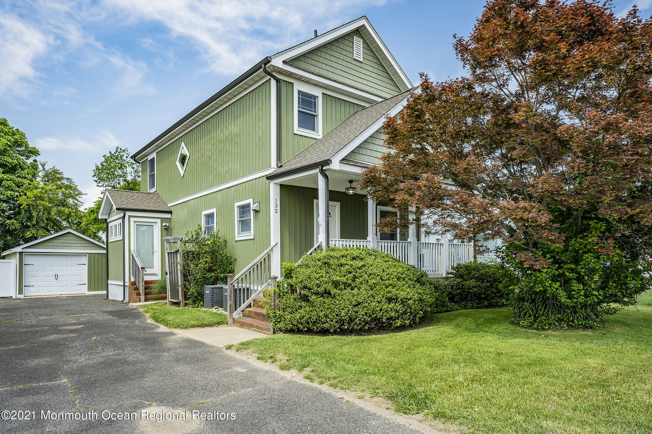 132 Sampson Place Long Branch, NJ 07740 - Photo 2 of 21 front view of a house with a yard